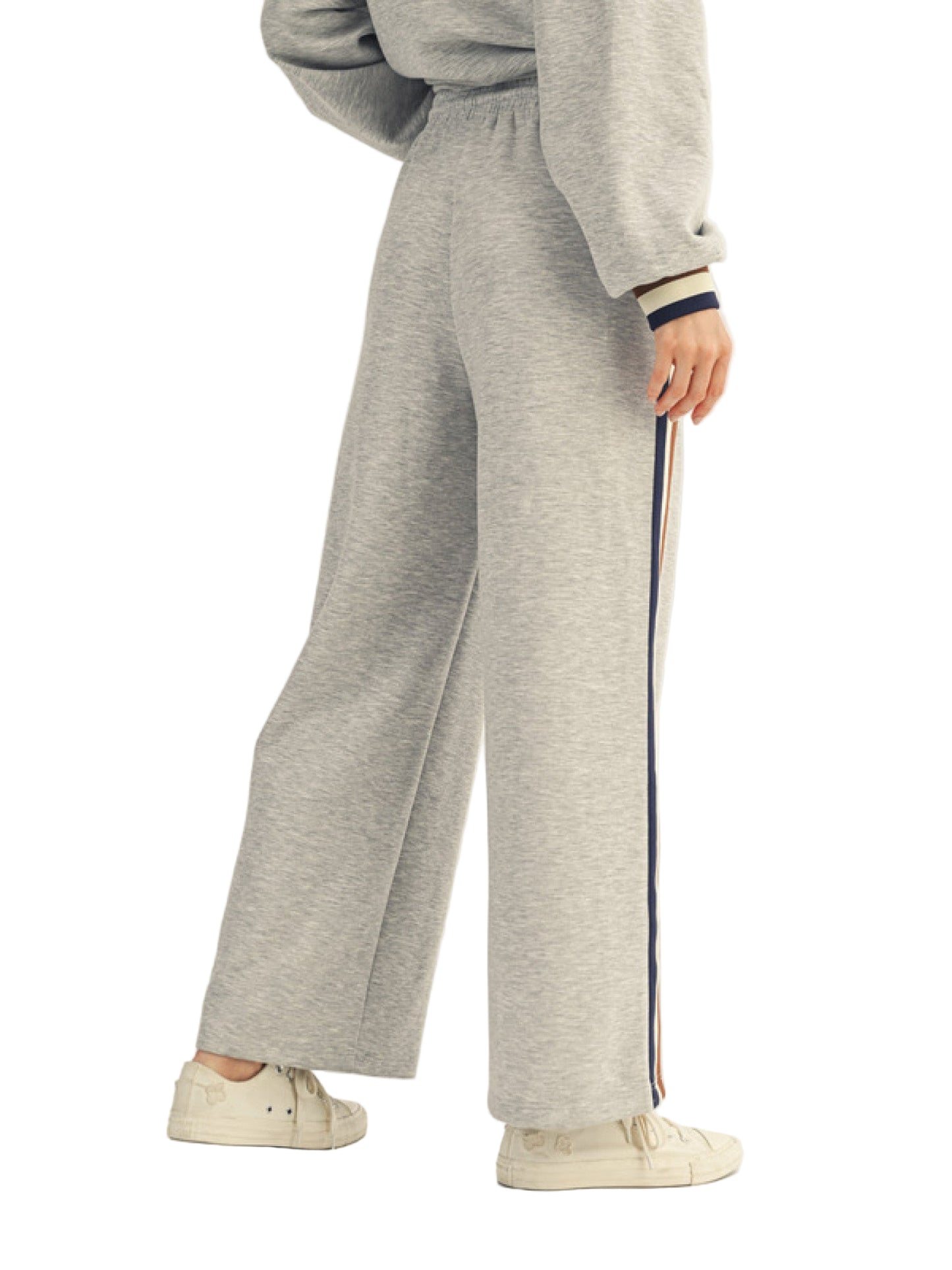 Drawstring waist solid sweatpants with side pockets, side colorblock trim accent.