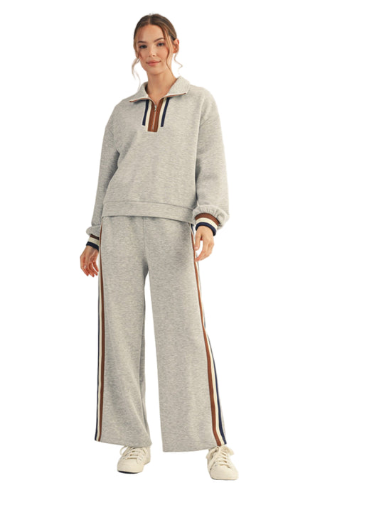 Long sleeves front zip up sweatshirt with colorblock trim detail.