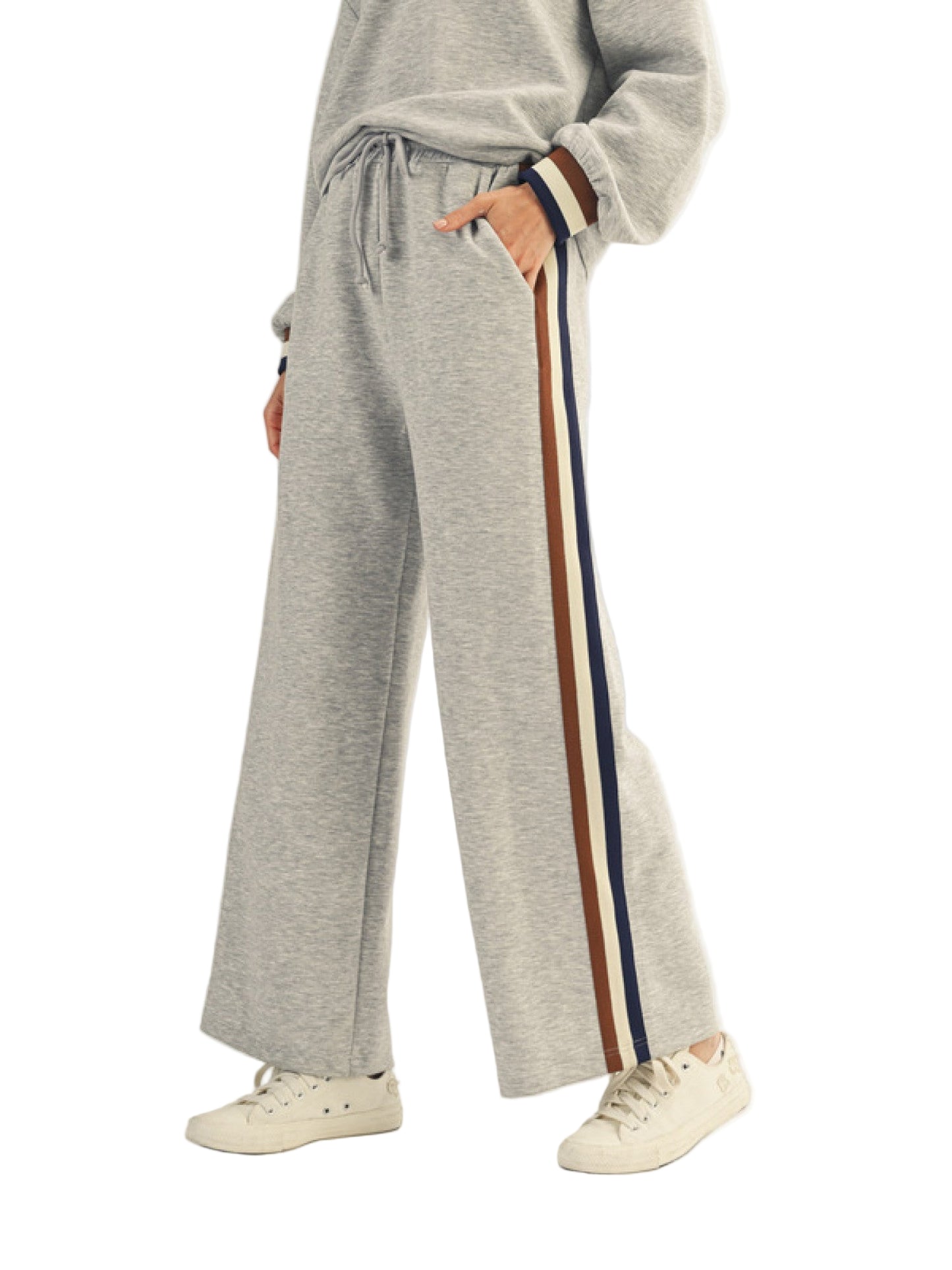 Drawstring waist solid sweatpants with side pockets, side colorblock trim accent.