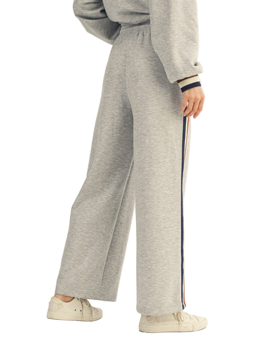 Drawstring waist solid sweatpants with side pockets, side colorblock trim accent.