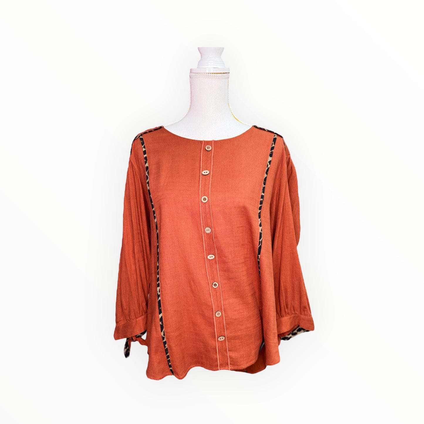 RUST TOP WITH CHEETAH PRINT DETAIL