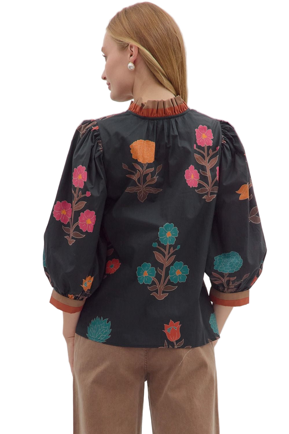Floral print 3/4 puff sleeve top featuring contrast trim split neck and cuffs
